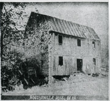'This Memories of Yesteryear photo of the Grist Mill at Boothsville in Marion County, West Virginia was taken in 1901. The mill was powered by a water wheel and was located at the intersection of Horner Run Road and Route 73. The photo was submitted by Mrs. J.E. Core of Route 2, Shinnston. Memories of Yeateryear is a feature of the Fairmont Times.'