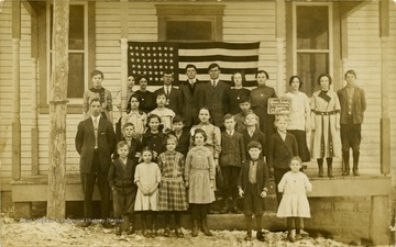 A Union School class portrait with Clifford Coombs, teacher. The school was located near Lowesville, (near what is present-day Rivesville.)