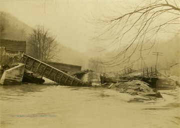 'Dynamited on account of high water.'