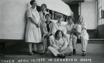 A group portrait of some of the girls who worked in the covering room of Fokker Plant.