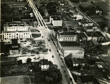 An aerial view of Princeton showing the courthouse square with the new courthouse and memorial building, and business houses, from approximately 700 feet. 'This photograph was in an envelope adressed to Mr. Anderson of The Bluefield Daily Telegraph in Princeton, from Tom Bowling of Montgomery, Alabama.'