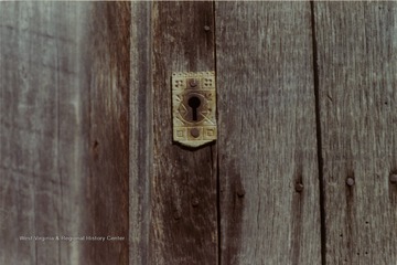 A picture of the lock on the door of the post office in Zenith. The post office building is opposite McClung's Mill.