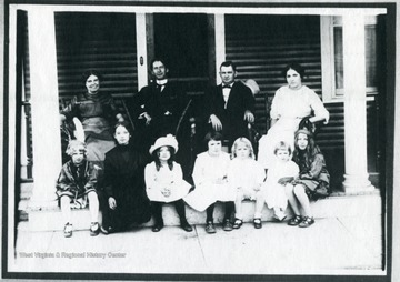 A group portrait. Top row: left to right are Mr and Mrs. W.W. Logan and Mr. and Mrs. Ben Gay. Bottom row: left to right: Mrs. Gladys Hancock, next two unidentified, Mrs. Edna Snead, Mr. Trigg Tabor, Mrs. Rinda Fowkles, and Mrs. H.H. Nichols.
