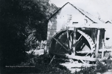 View of 'Old Pack Mill at Jumping Branch, Little Blue Stone, not there now. It was run by pioneer Samuel Pack, whose son was Samuel Pack Jr. My mother took corn there 80 years ago.' 'Burned 2 or 3 years ago.'