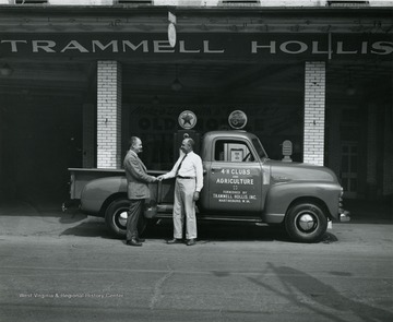 Lettering on truck door reads:  '4H Clubs and Agriculture  - furnished by Trammell Hollis, Inc., Martinsburg, W. Va.'