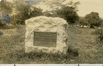 A view of a memorial stone at Jackson's Mill. It reads: 'This tablet marks the site of the boyhood home of General T. J. 'Stonewall' Jackson, a soldier of great military genius and renown, a man of resolute, pure and Christian character. Died May 10, 1863 of wounds received at the Battle of Chancellorsville, Virginia.'