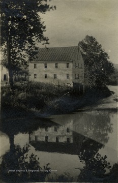 A view of Jackson's Mill and it's reflection in the river.
