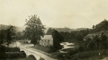 A distant view of Jackson's Mill and the road leading to it.