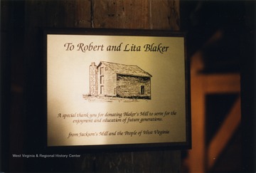 A view of a plaque to honor Robert and Lita Blaker.  Blaker's Mill is a Greenbrier County mill relocated to Jackson's Mill.