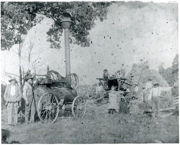 Taken on James Ruddle Farm on the Buffalo Hills. In the foreground, from left to right: James Dyer Ruddle, Charley Ruddle, Maggy 'Ruddle' Hartman, Hannah ' Ruddle' Simmons, Jane Ruddle, Cora Ruddle, Clay Ruddle.