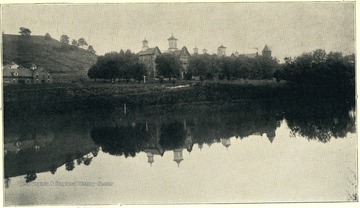 A view of Spencer State Hospital across the lake. W. D. McClung, M. D., Superintendent. This institution is located at Spencer, Roane County, and is reached by the Baltimore and Ohio Railroad. Number of Patients June 30, 1922 was 615.