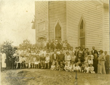 A group portrait of members of the Old Baptist Church, Crab Orchard in Raleigh County, West Virginia.