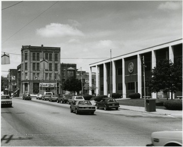 'Spencer (population 2799) is the home of the Black Walnut Festival every October and the modern Roane County Courthouse (right.)  Several small industries provide employment, including the Automotive Trim Division of NI Industries, Inc.'