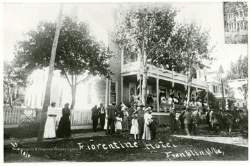 Many people gathered on the front porch of and around the Florentine Hotel in Franklin.