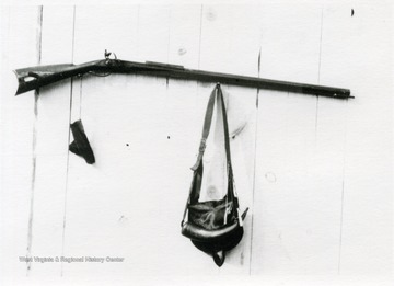 Flintlock rifle, shot pouch and powder horn belonging to Wm. Craven Miller of Ft. Sybert who died in 1917.  He gave this to his grandson Stanley Miller in 1914.  Now owned by Neva Miller, his sister.
