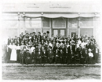 Group portrait of Teacher's Institute participants.  Taken in front of Bowman's Store in Franklin.