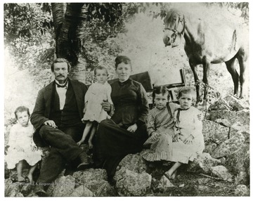 Henry Clay Ruddle Family, Buffalo Hills, Pendleton County, W. Va.  Pictured left to right:  Clara (Ruddle) Ruddle, H.C. Ruddle, Ona Ruddle, Mary S.(Hedrick) Ruddle, Lura (Ruddle) Byrd, Maud Ruddle and Daizy. 