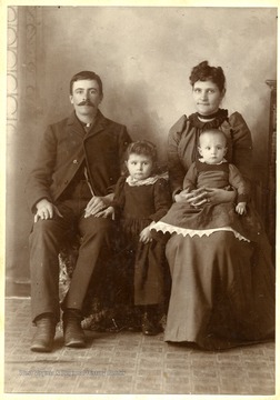 Oliver Kalar Dumire & Sophia Ann Landsberry Dumire pictured with their children Leota Gretia Dumire and Abraham Orvis Dumire. 
