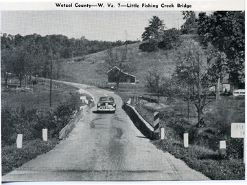 View of automobile traveling on W. Va. 7 over Little Fishing Creek Bridge in Wetzel County.