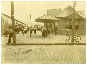 People on the platform at a Railroad Station, New Martinsville, Wetzel County, W. Va.