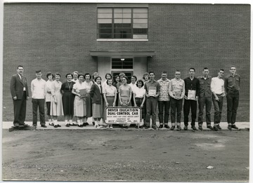 Driver Education Class, 1956, Webster County, W. Va.  Front Row Pictured Left to Right:  Robert Andrick (Instructor), Elbert Gum, Arvilla Pugh, Margaret Shipman, Mary McCoy, Ania Schrader, Aaron Chapman, Bill Gibson, Joey Friend, Bill Hull, Roger Hall, Raymond Gregory and Bernard Lewis.  Back Row Pictured Left to Right; Willavene Riffle, Norma Shears, Shirley Eubank, Mava Helmick, Jane Wilson, Molly Pulliam, Carolyn Foreman and Macel Lowther.