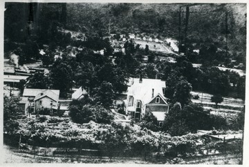 'View of Brooklyn Heights, an incorporated town in Tucker County, W. Va. from 1905-1914.  The town was noted for its iniquity where sin and gin and robbery and murder prevailed.  O. Homer Floyd Fansler, Hendricks, W. Va. is written on the back of the photo.'<br />