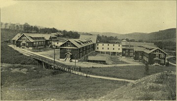 View of the hospitals and dining hall at the State Tuberculosis Sanitarium. J. G. Pettit, M. D., Superintendent. This institution is located two miles east of Terra Alta, Preston county, on the main line of the Baltimore and Ohio Railroad. The local station is called Hopemont, but only local trains stop here. All passenger trains stop at Terra Alta, which is the express office. The post office is Hopemont. Number of patients in June 30, 1924 was 266.