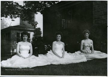 Pictured left to right; Aimee Smith-Maid of Honor, Joyce Rodenheaver-Queen of May and Barbara Peterson-Maid of Honor.   