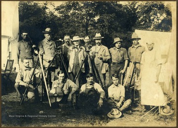 A group portrait of the Deakins Line Surveying Team of Preston County, West Virginia.  Back row, second from the left:  Samuel Gannett, U.S. Geological Survey.  Back row, fourth from the left:  William McCulloh Brown, Maryland Commissioner.  Back row, fourth from the right:  Julius Monroe, West Virginia Commissioner.
