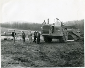 'Second from left is Harold Fetty.  Third from left is Jim Martin.'  Possibly prior to the construction of Westover Park.