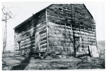 'Built in 1803. Great Grandaddy Fox 'Martin Fox' went here to meeting in 1808.  He was born Aug. 2, 1790 and died in 1884.  Monongalia Papers, Volume 2.  Photo taken by Mrs. Gilbert Straight, the first wife, on the J. P. Fox farm.  Some people say enlarged for tombstones went back into late 1700's.'