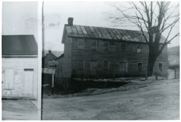 'The old Powell home, one time a hotel.  Torn down 1956.'