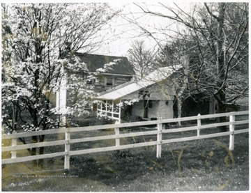 'Cabins of pioneer settler Thomas Lazzle as they appeared in 1976.  The building in the foreground is said to have been constructed in the 1770's, the other about 1790.'  From the Monongalia Story, vol. 2, by Earl Core.