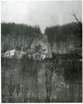 On a hillside along the Morgantown and Kingwood Branch of the Baltimore and Ohio  Railroad.