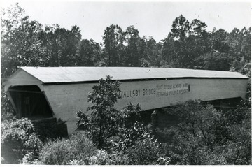 Bridge was built in 1855 by Elmore Hart and repaired in 1911 by C. A. Short.