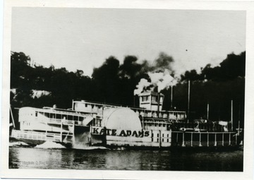 A picture postcard of the steamboat Kate Adams on the Ohio River near Wheeling, West Virginia.