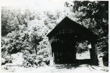 The old covered bridge is ready to fall down.