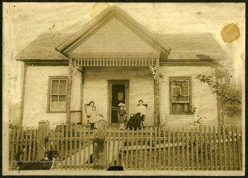 '711 N. Kanawha Street, Beckley. From left to right: Mrs. Z. W. Lafon, Clara (Mrs. J. J. Lamb), Nellie Harlow (Mrs. E. Larrick) Daughter of A. N. Harlow, Mrs. A. N. Harlow Mabscott.'