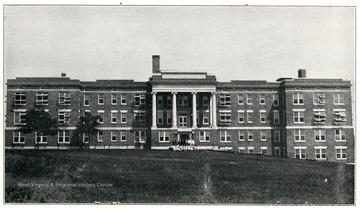 A view of the front side of the hospital.  This institution is located at Beckley, Raleigh County, and is reached by branch line of the Chesapeake and Ohio Railway from Prince, by branch of the Virginian from Mullens, by Taxi from Hinton or Thurmond on the C. &amp; O. or Lester on the Virginian and by bus or auto over U.S. Routes 21 and 19 and state routes 65, 21 and 12.  As of June 30th, 1930 there were 103 patients.