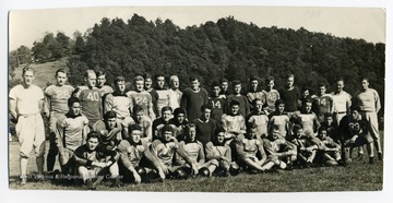 Group portrait of the 1938 West Virginia University Football Team. Standing first on left is Coach Glenn.