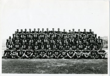 Group portrait of a West Virginia University Football Team. 'Taylor Publishing Co. Job Number 07206, Picture Number 3, Page Number 198, West Virginia University, Morgantown, West Virginia.'
