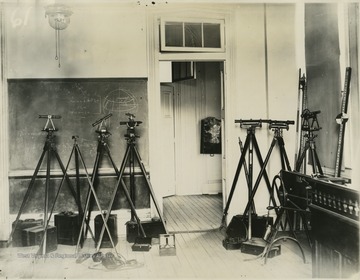 Civil Engineering room. View of instruments, note the gas lights, before electricity, in Science Hall. 'Wanld's Fair Picture'