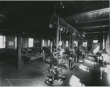 View of machine in Mechanical Hall II building, where room 117 is now.