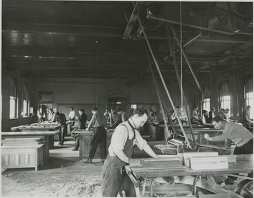 View of students and instructor at Mechanical Hall II building.  Instructor- left background, Stillman.