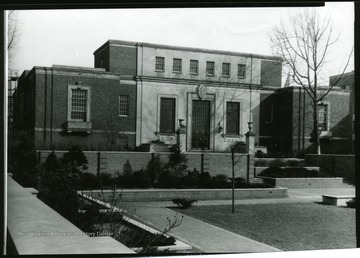 Construction begin on the main section of the library in 1930. The tower or floors six through 10 were added in 1950. This photo of the building before the addition of the tower, was possibly taken in the 1940's.