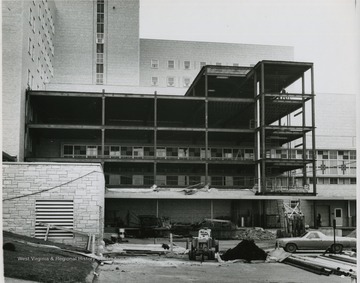 View of the construction process at WVU's Medical Center.  Car pictured at right.