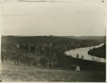 'West Virginia University and Morgantown (1891-1892) as taken from a point some distance north of the U. The Catalogue for one of those subsequent years states that Science Hall was finished in 1893, but no sign of it is to be seen in this picture, but the roof was on Commencement Hall, and the Court House was built (1892), which fixes the date about as given above.' 'View of Morgantown &amp; Sunnyside taken from North Morgantown Hill. Note the orchard along Overhill St. also showing the house owned by the Whites nearby.'