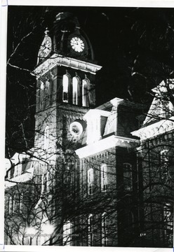 View of Woodburn Hall, West Virginia University, at night.