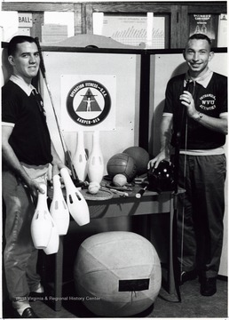 Members of the Operation Fitness, U.S.A.  Equipment includes tennis balls and racket, basketballs, bowling, and archery equipment.