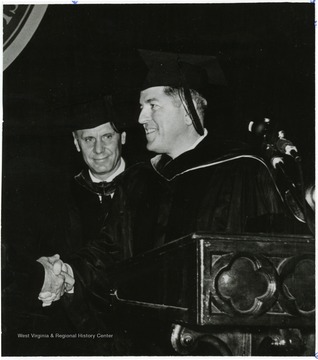 'Left, President Paul A. Miller; right, Joseph S. Farland '36 former ambassador to Dominican Republic and Panama, now with Georgetown University.'